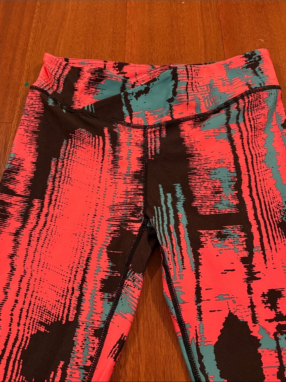 Fabletics Capri Leggings - Coral, Teal & Black - Picture 3 of 6